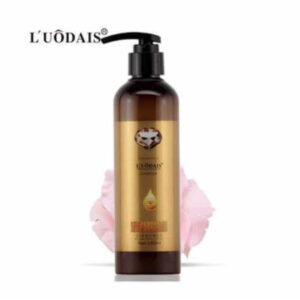 Brown bottle with pump and gold label on a white background, featuring the brand 'Léuôdaès'.